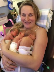 Against impossible odds, identical triplets defy science, thrive